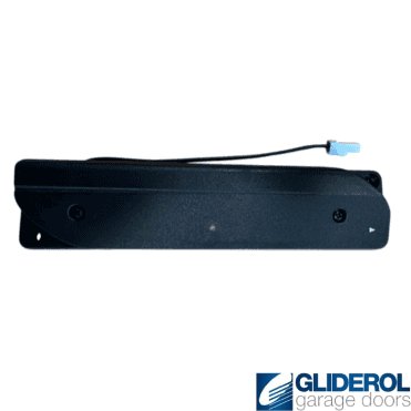 Bottom slat transmitter for gliderol insulated door